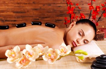 adult-woman-relaxing-spa-salon-with-hot-stones-back-beauty-treatment-therapy-1