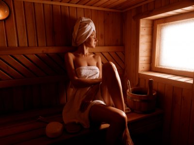 girl-spa-treatment-traditional-sauna-with-brush-skin-washcloth